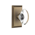 Studio Plate Double Dummy Oval Clear Crystal Glass Door Knob in Antique Brass